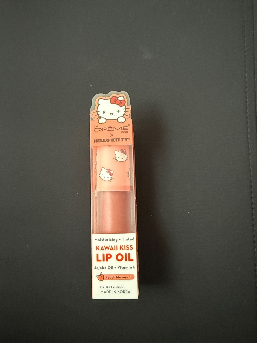NWT The Crème Shop Hello Kitty Peach Flavored Tinted Kawaii Kiss Lip Oil